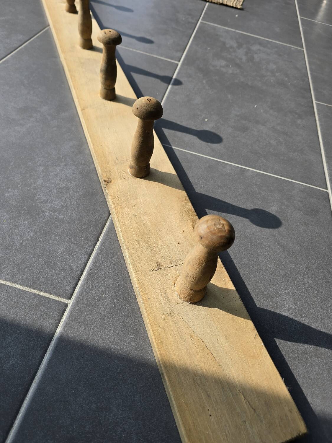 Antique wooden coat rack with 6 hooks