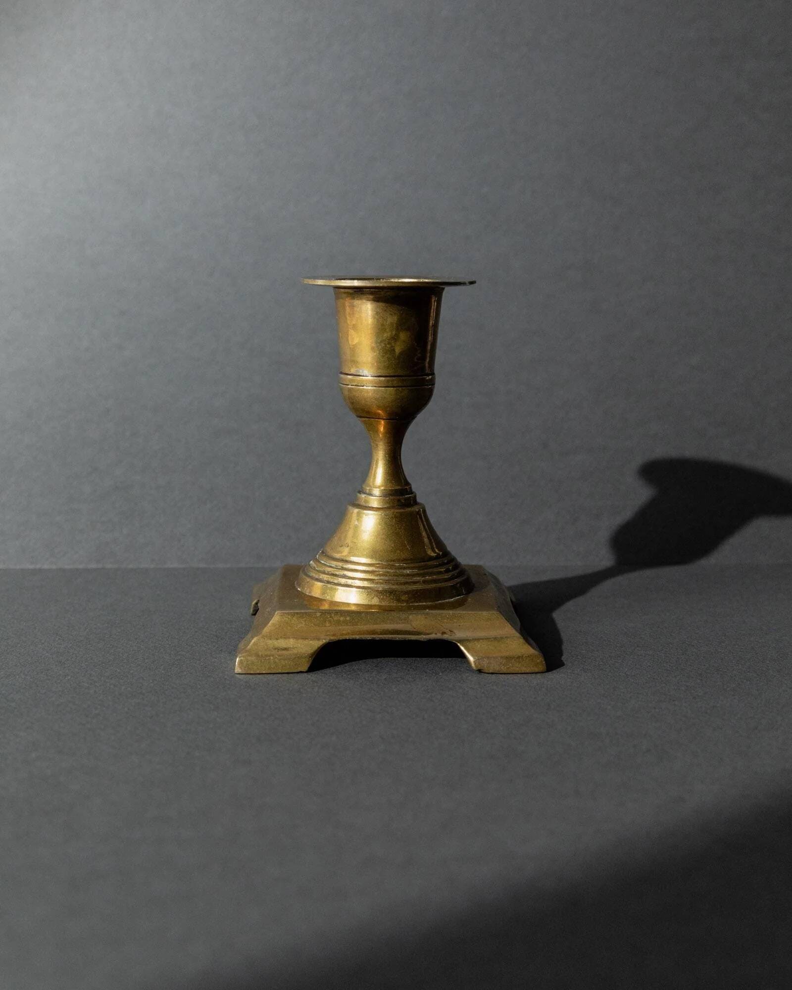 Vintage set of 3 brass candlesticks from the 1940s, various shapes.