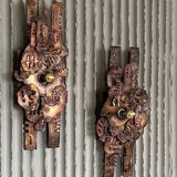 Set of raw expressive wall sconces by Francesco Pasinato