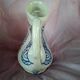 Zoomorphic pitcher in enamelled terracotta