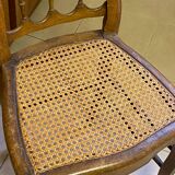 Antique wooden chair, cane seat