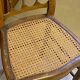 Antique wooden chair, cane seat