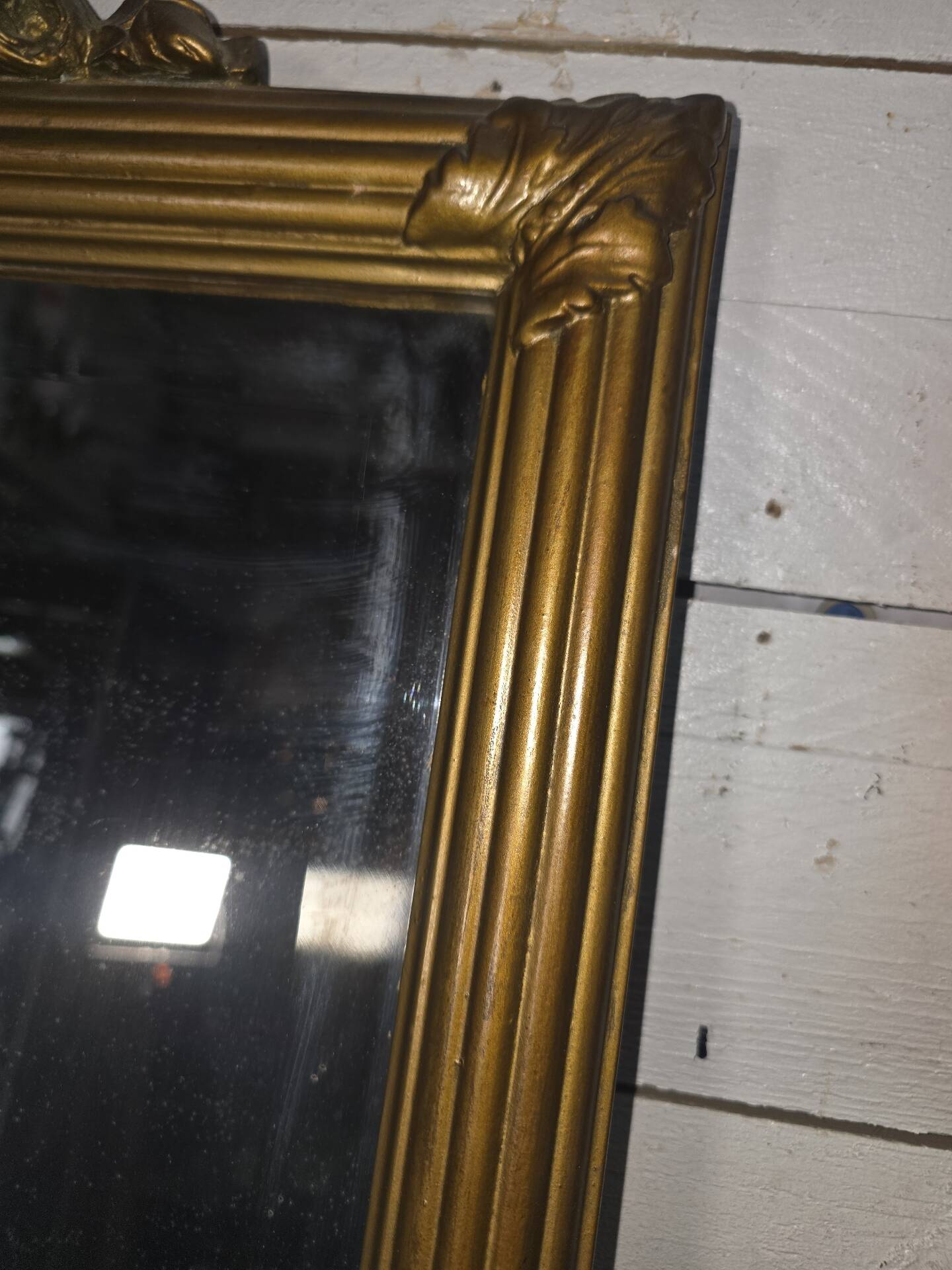 Miroir doré style Louis XVI
