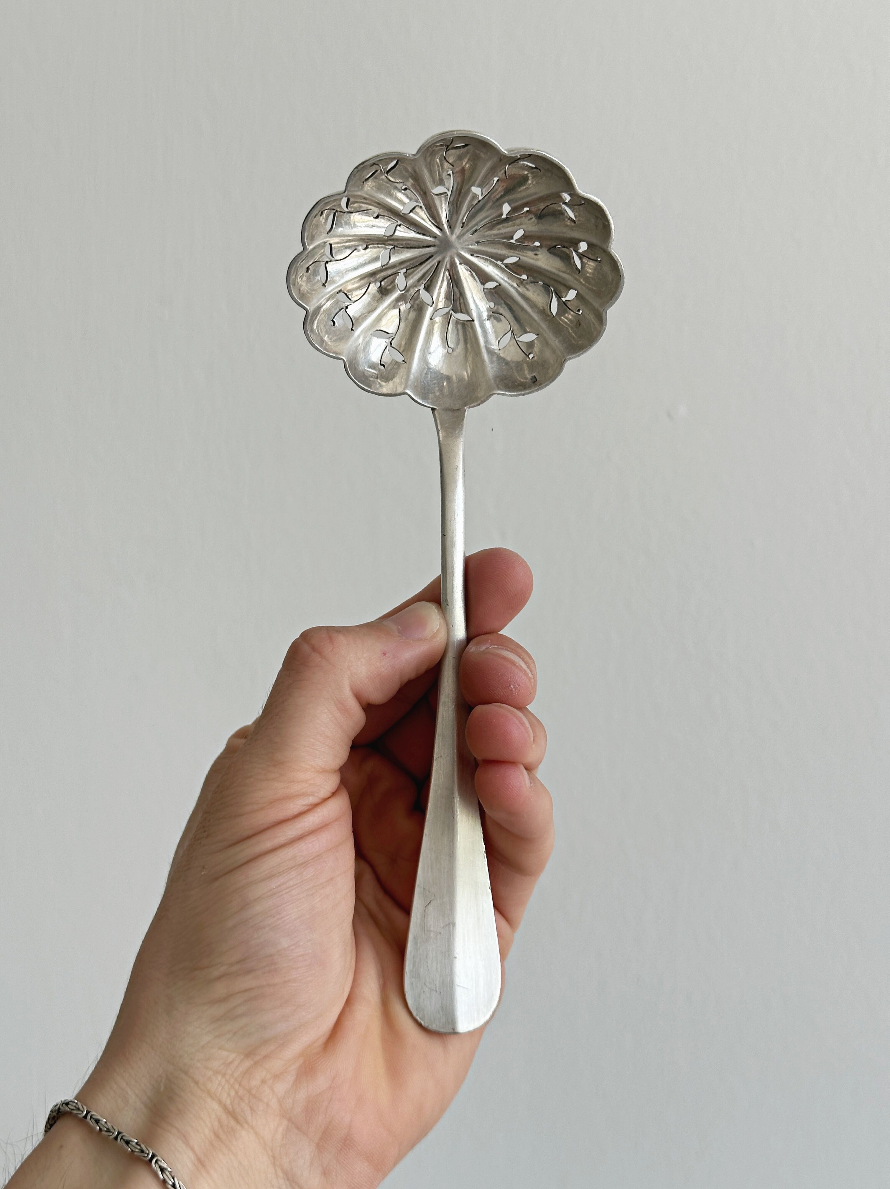 Cuillère à saupoudrer en métal argenté