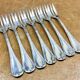7 Christofle silver-plated oyster forks with Louis crossed ribbons