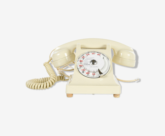 Ancien téléphone en bakélite blanc des années 1940