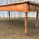 Antique farmhouse table in solid cherry wood in Louis Philippe style.