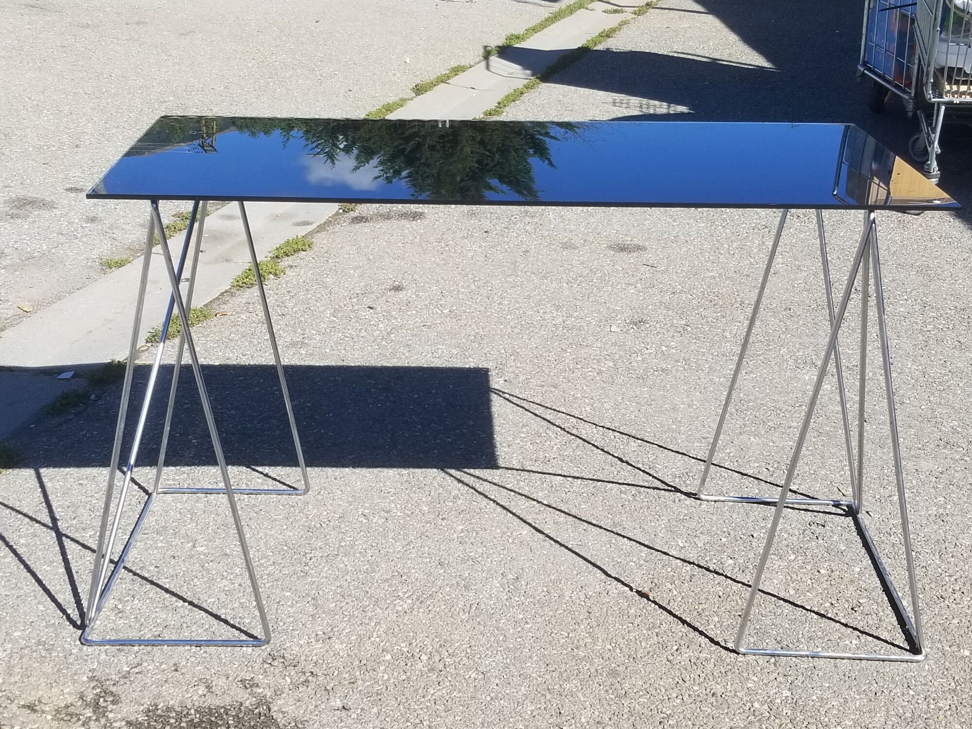 Vintage steel wire desk with chrome trestles and smoked glass top