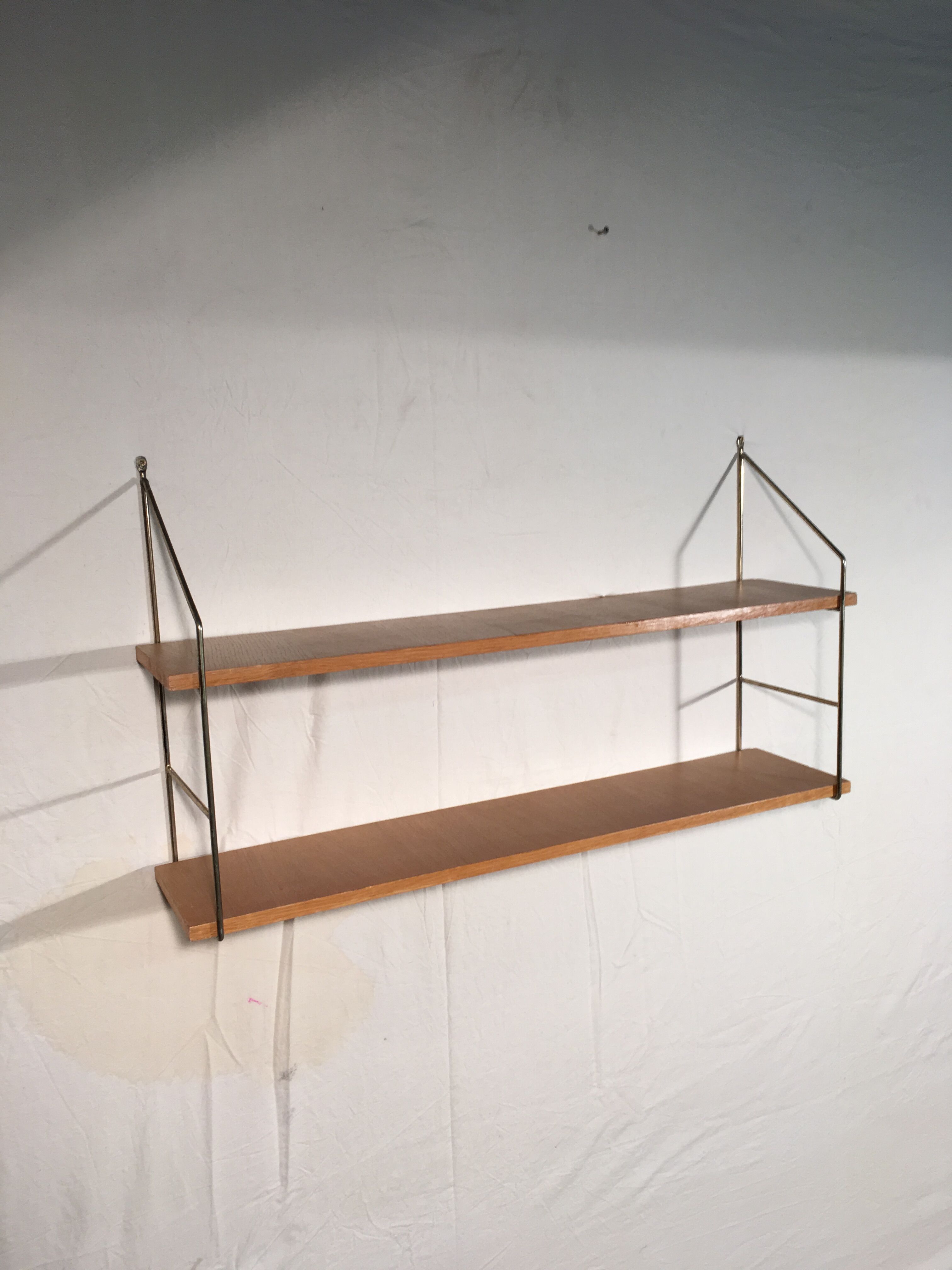 String shelf 1950