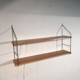 String shelf 1950