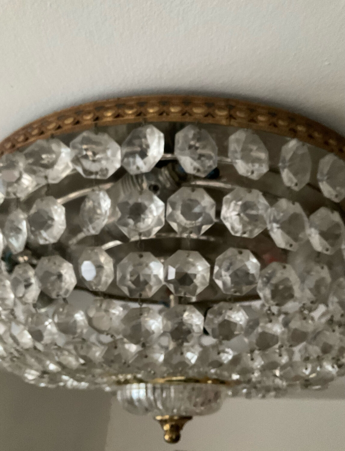 Vintage ceiling light with pendants and brass.