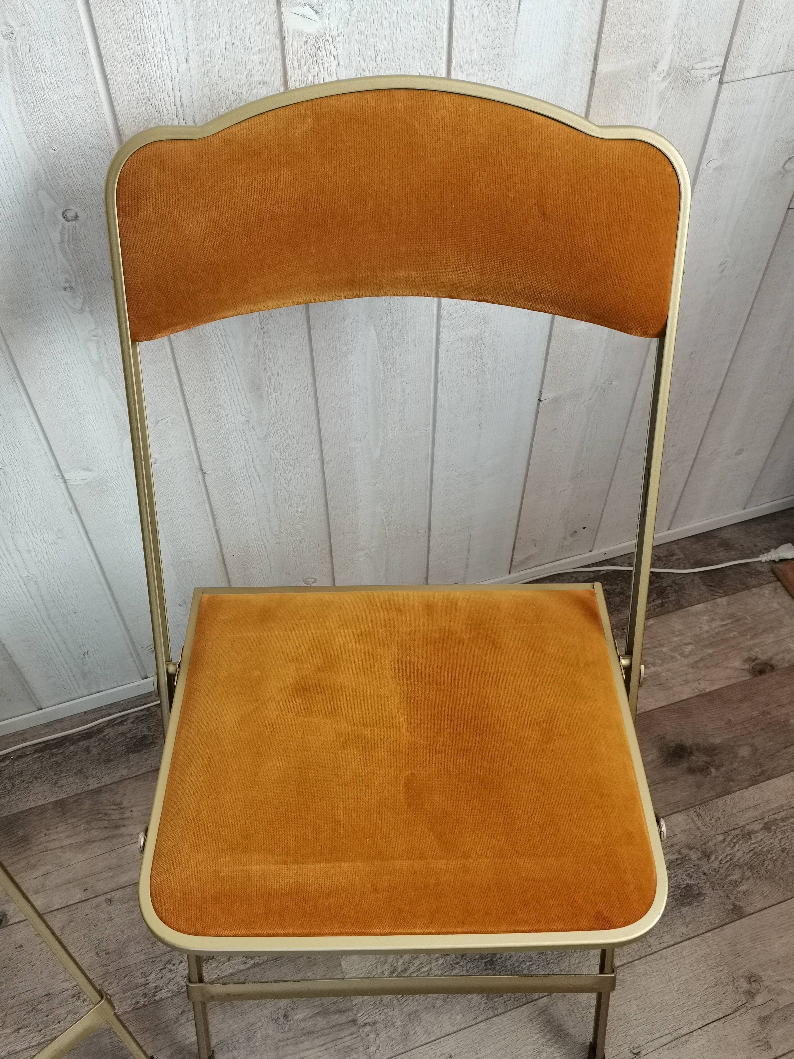 Two gold velvet chairs