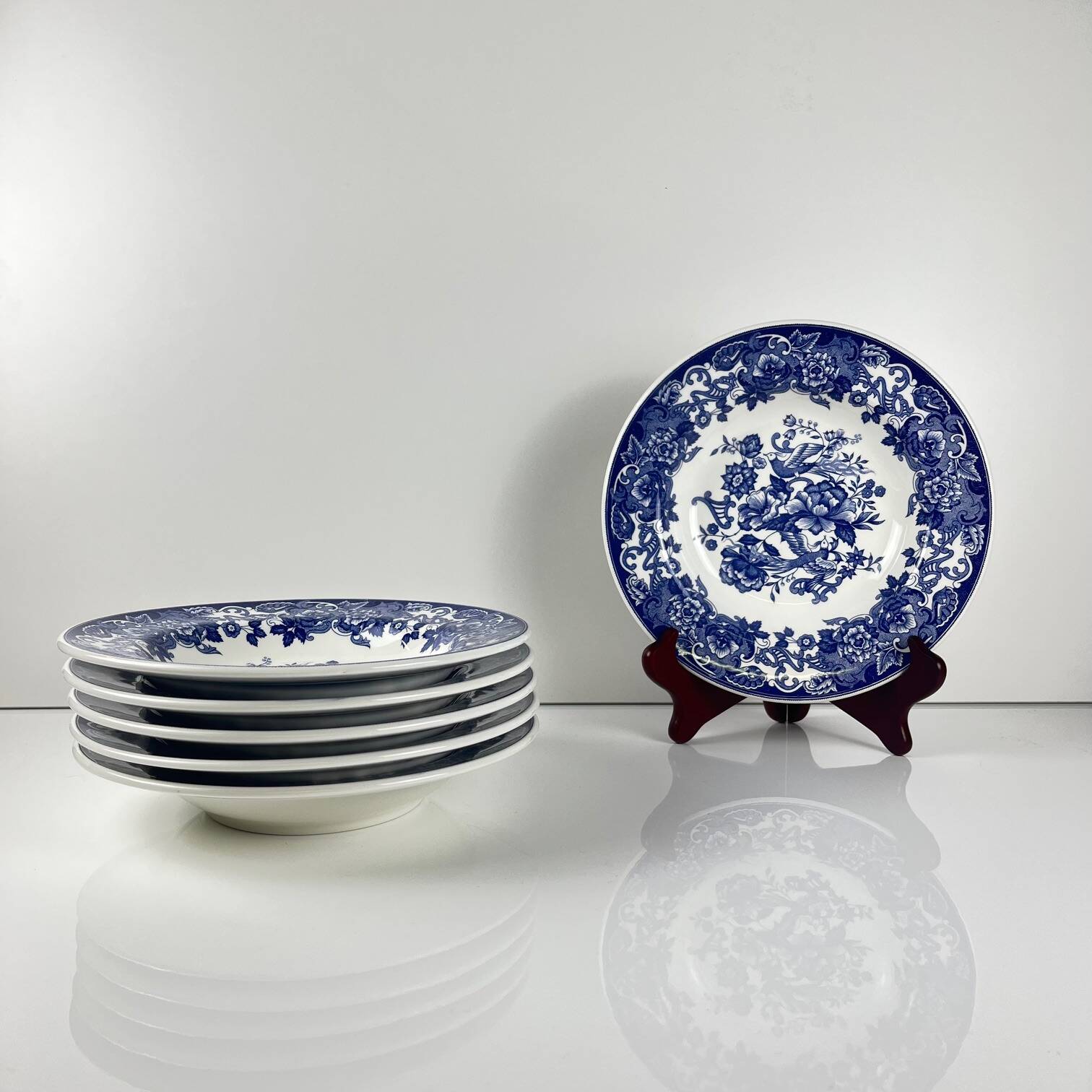 Set of 6 blue earthenware soup plates, floral and bird decoration, early