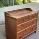 Commode scandinave en bois massif avec 4 tiroirs années 90
