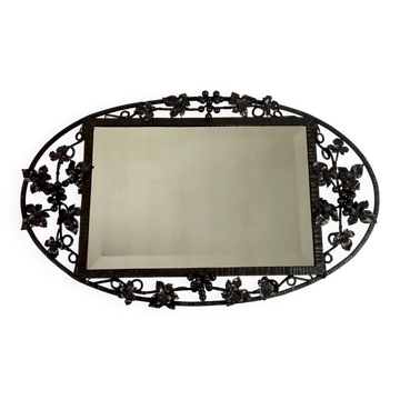 Art Deco wrought iron mirror with vine decoration, France, circa 1920