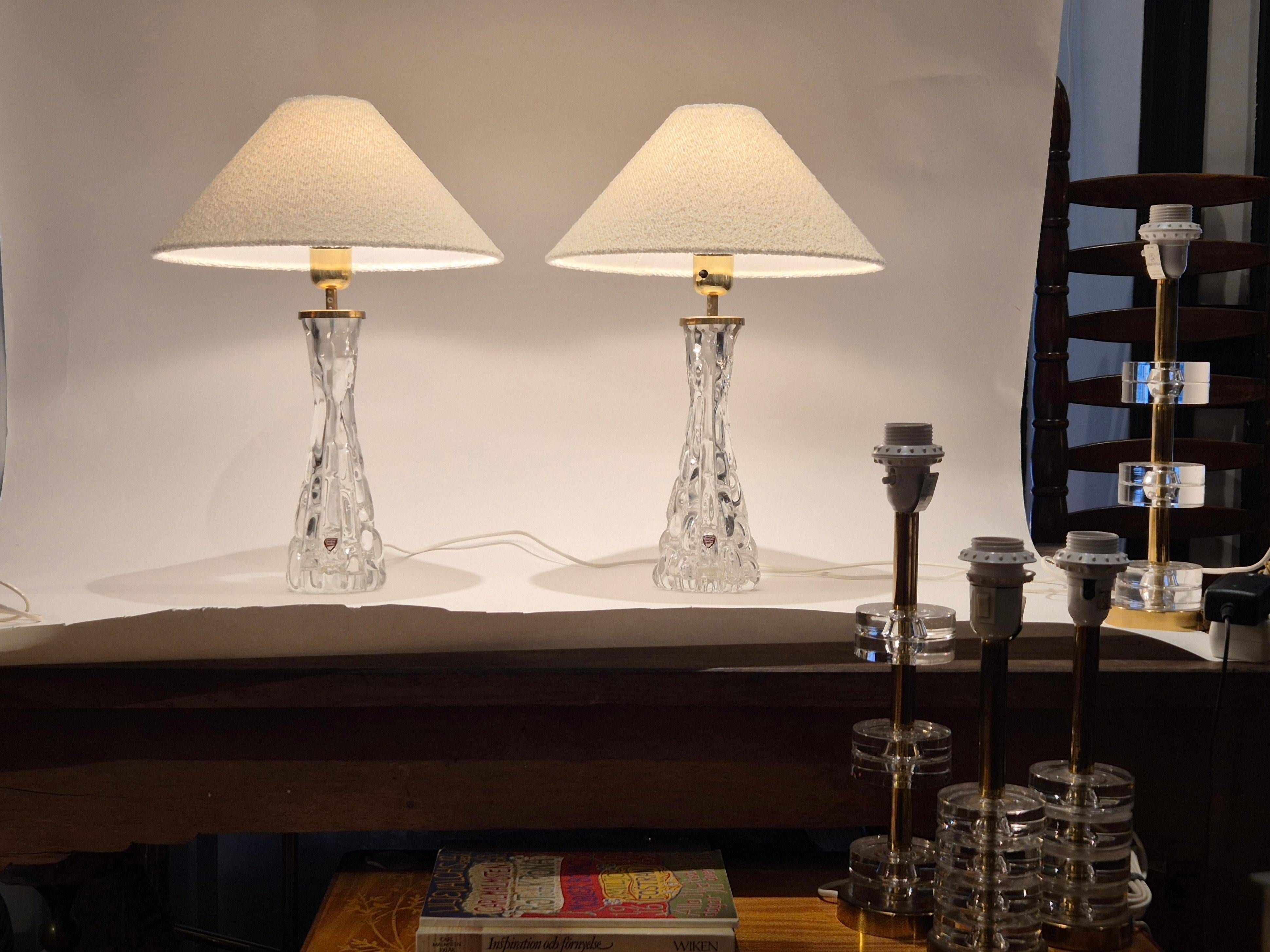 Elegant pair of table lamps The Modern Scandinavian Modern with Orrefors glass and brass.
