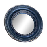 Convex mirror, also known as a witch's mirror.