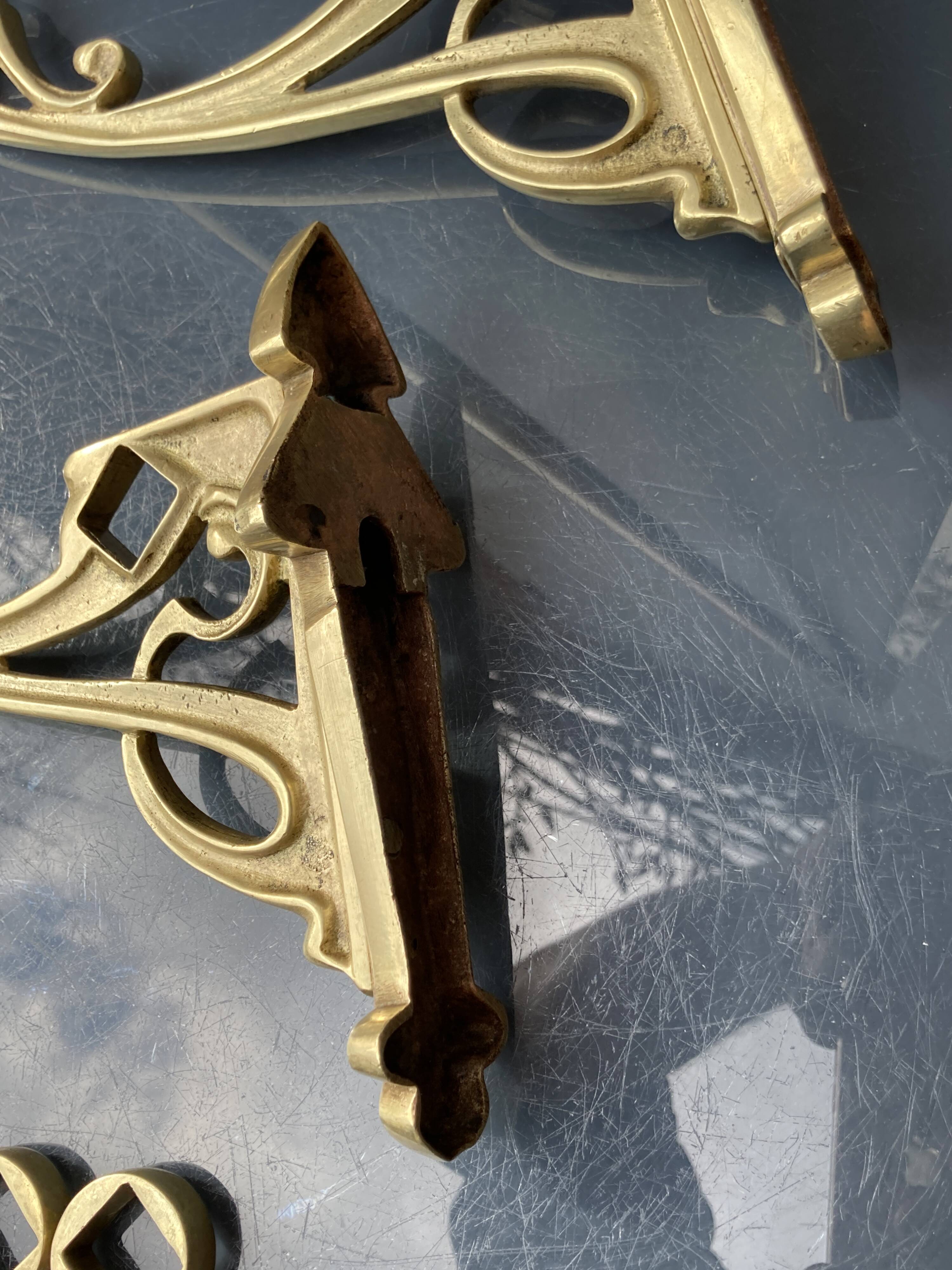 Art-deco wall-mounted coat rack in brass