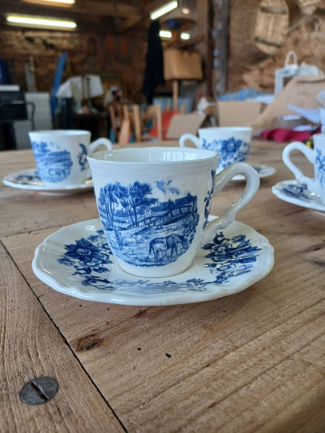 4 antique cups and saucers