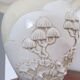 Pair of relief enameled porcelain lamps, Asian motif