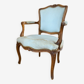 Louis XV convertible armchair in carved cherry wood