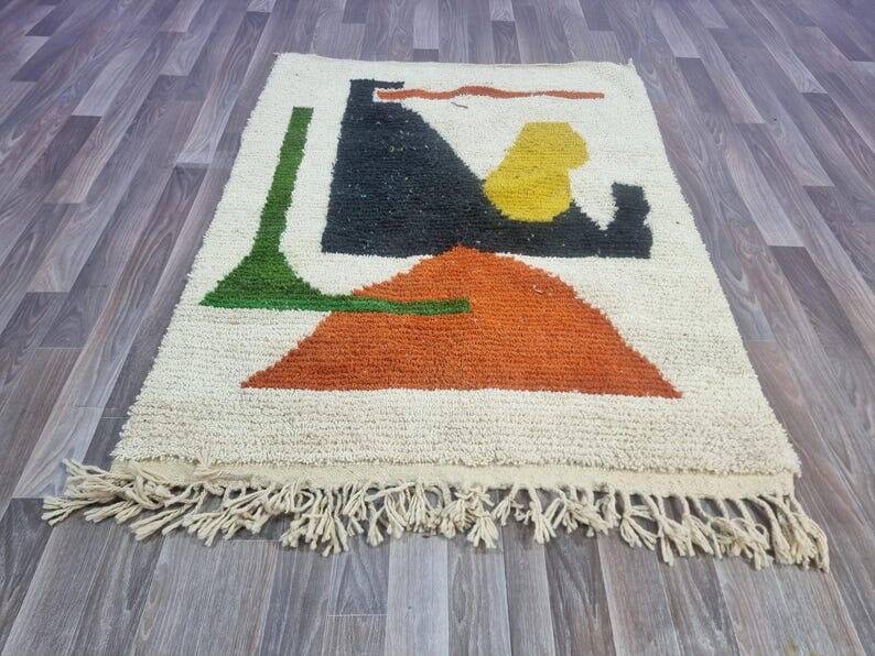 Handmade traditional Moroccan rug with colourful patterns, size 140x260 cm.