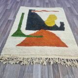 Handmade traditional Moroccan rug with colourful patterns, size 140x260 cm.