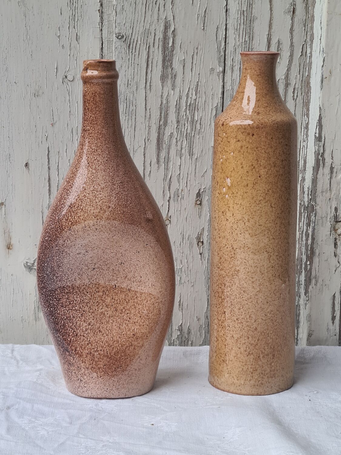 Two bottles glazed terracotta sculpture