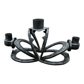 Atypical wrought iron candlestick
