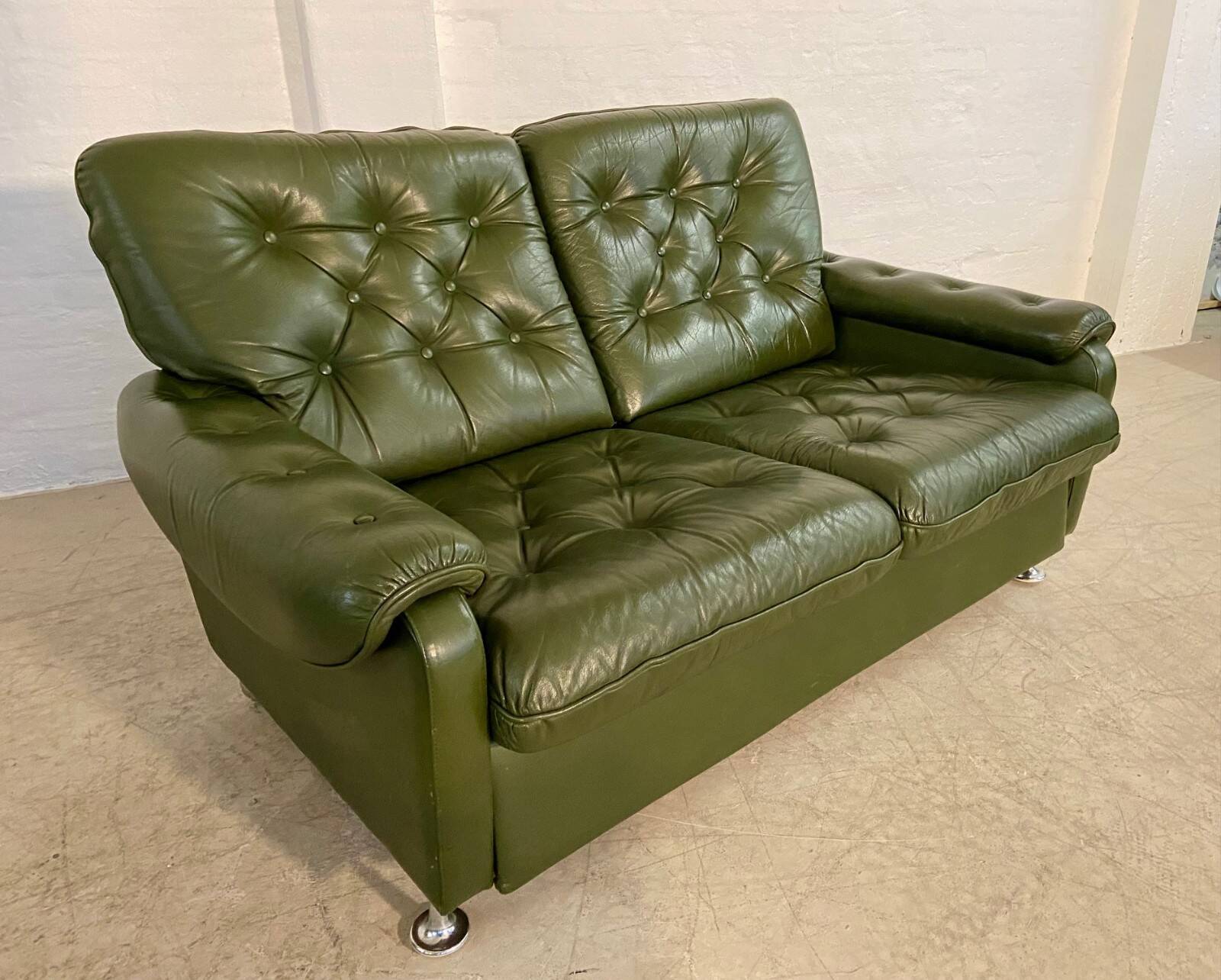Vintage retro Danish 2 person olive green buttoned leather sofa 1970s