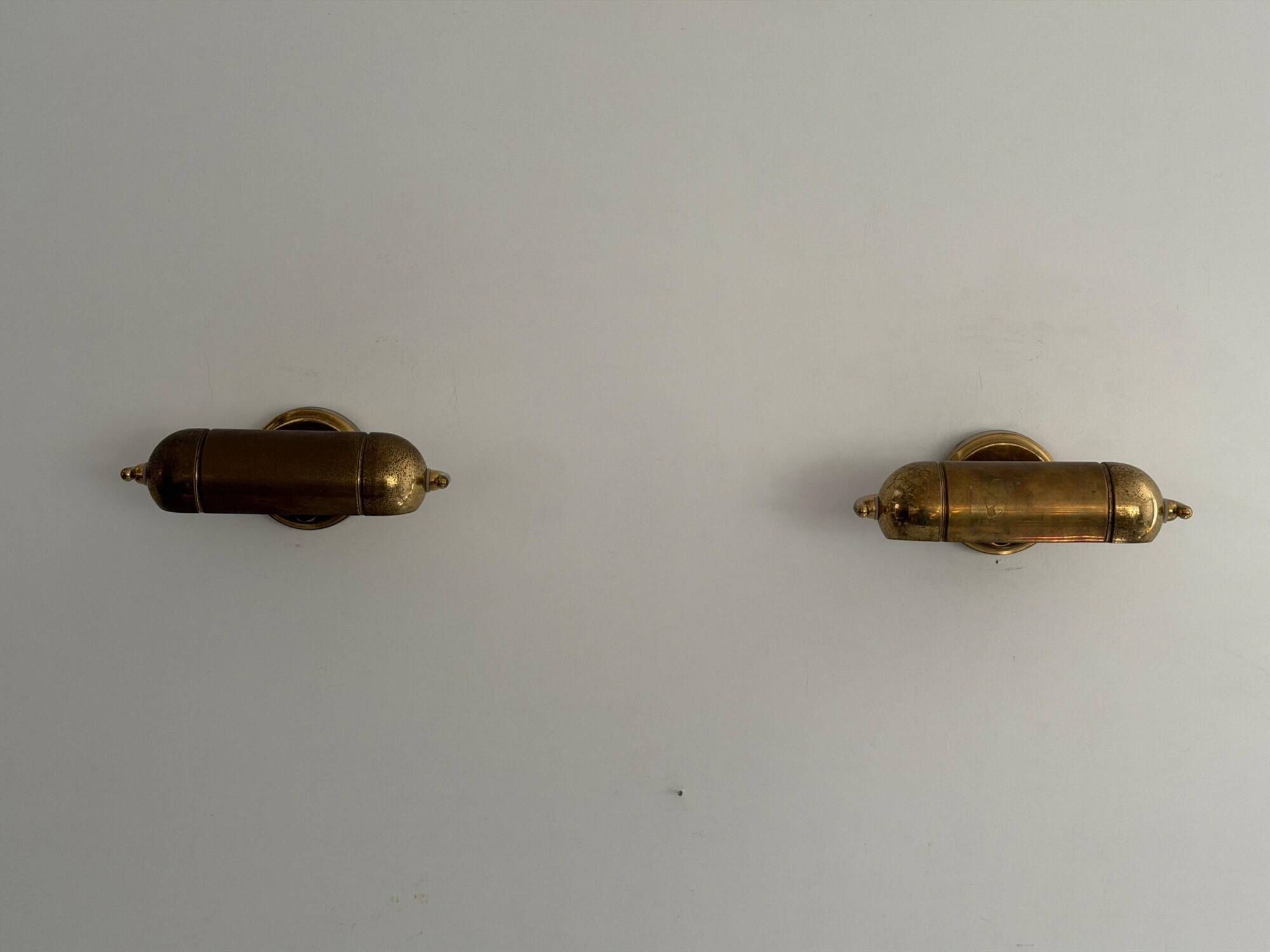 Pair of brass wall lights from the mid-century by N Leuchten, 1960s, Germany.