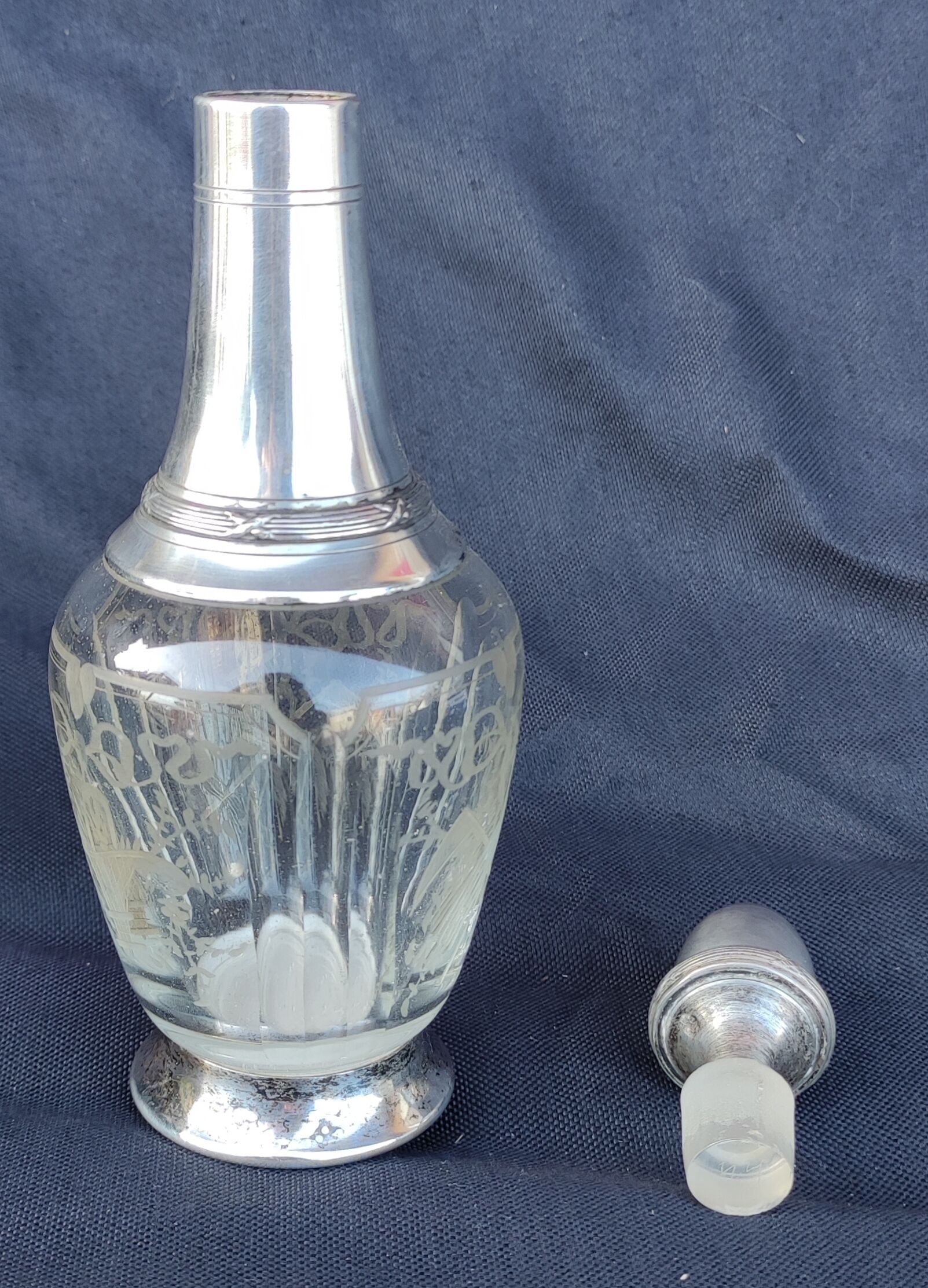 Old silver metal carafon