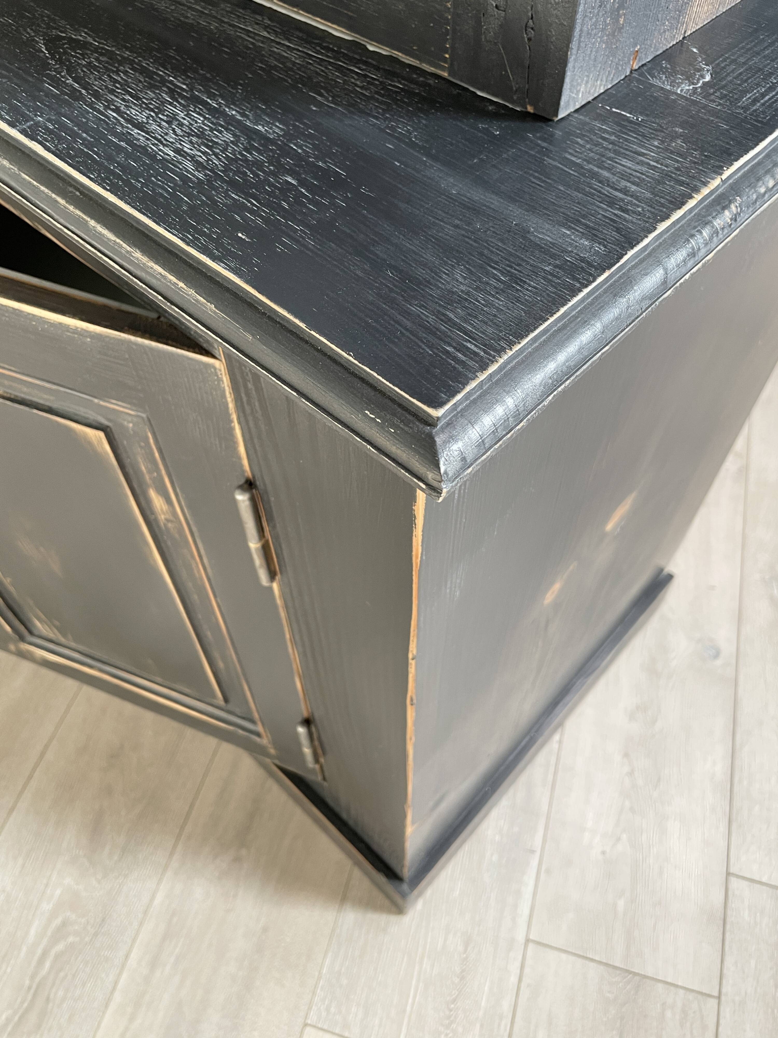 Display cabinet in patinated wood