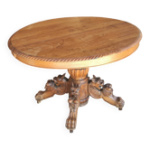 Oval oak table with carved details - known as a hunting table.