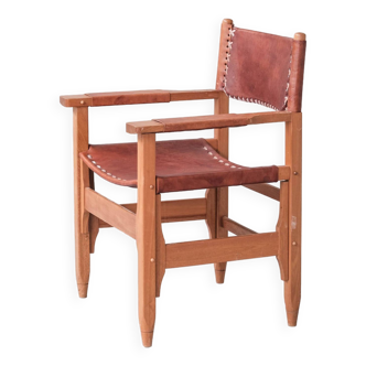 Paire de fauteuils vintage en cuir, France