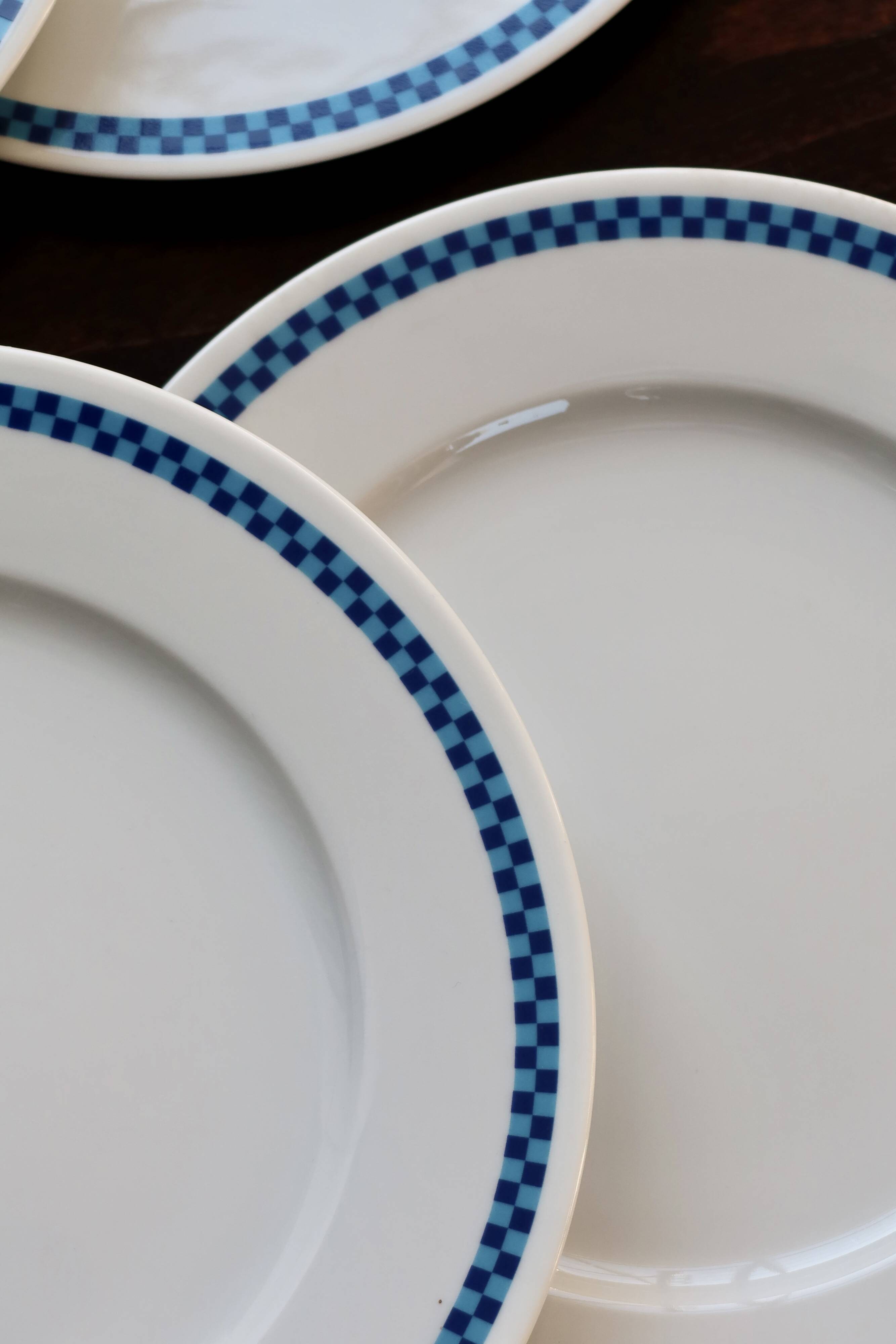 6 vintage Lustucru porcelain plates with a blue checkerboard pattern