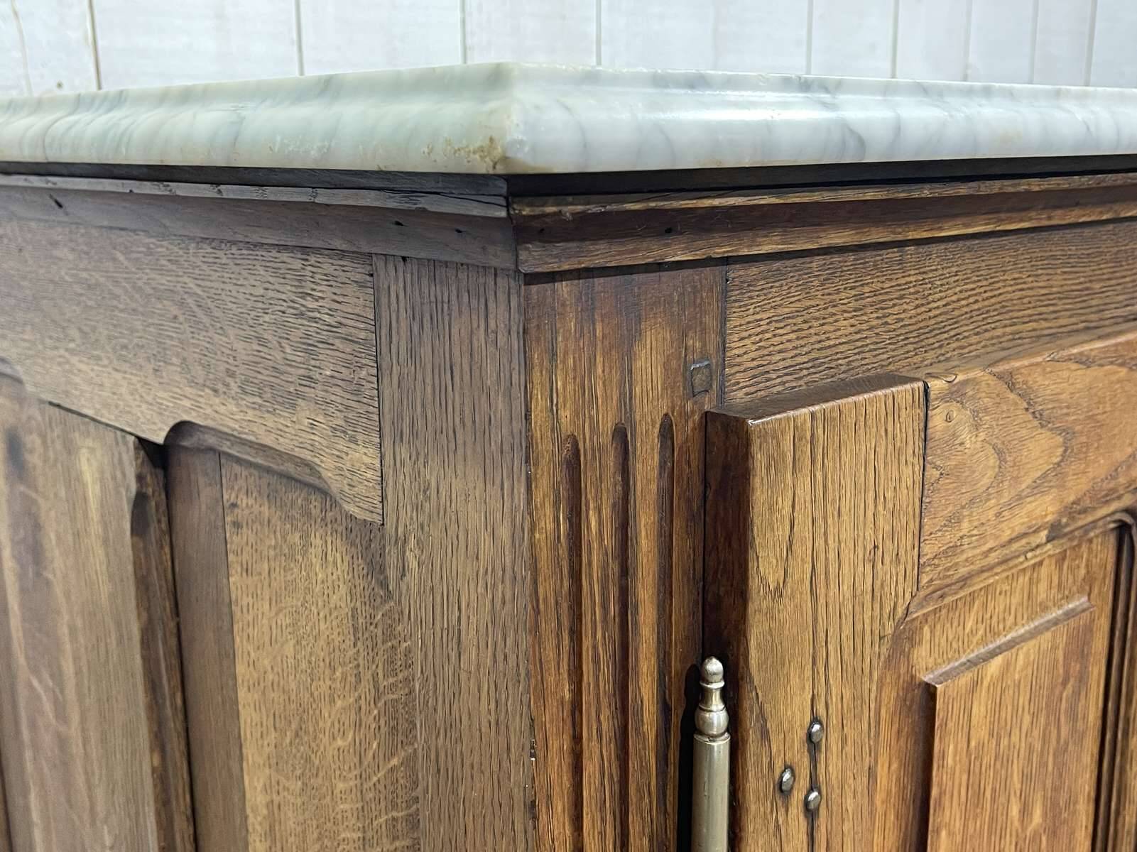 Glacière début XXème en chêne et dessus marbre