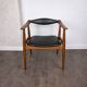 Chaise en chêne et cuir noir, modèle "Yoke" CH-34 par Hans J. Wegner pour Carl Hansen & Søn, Danemark, 1960.