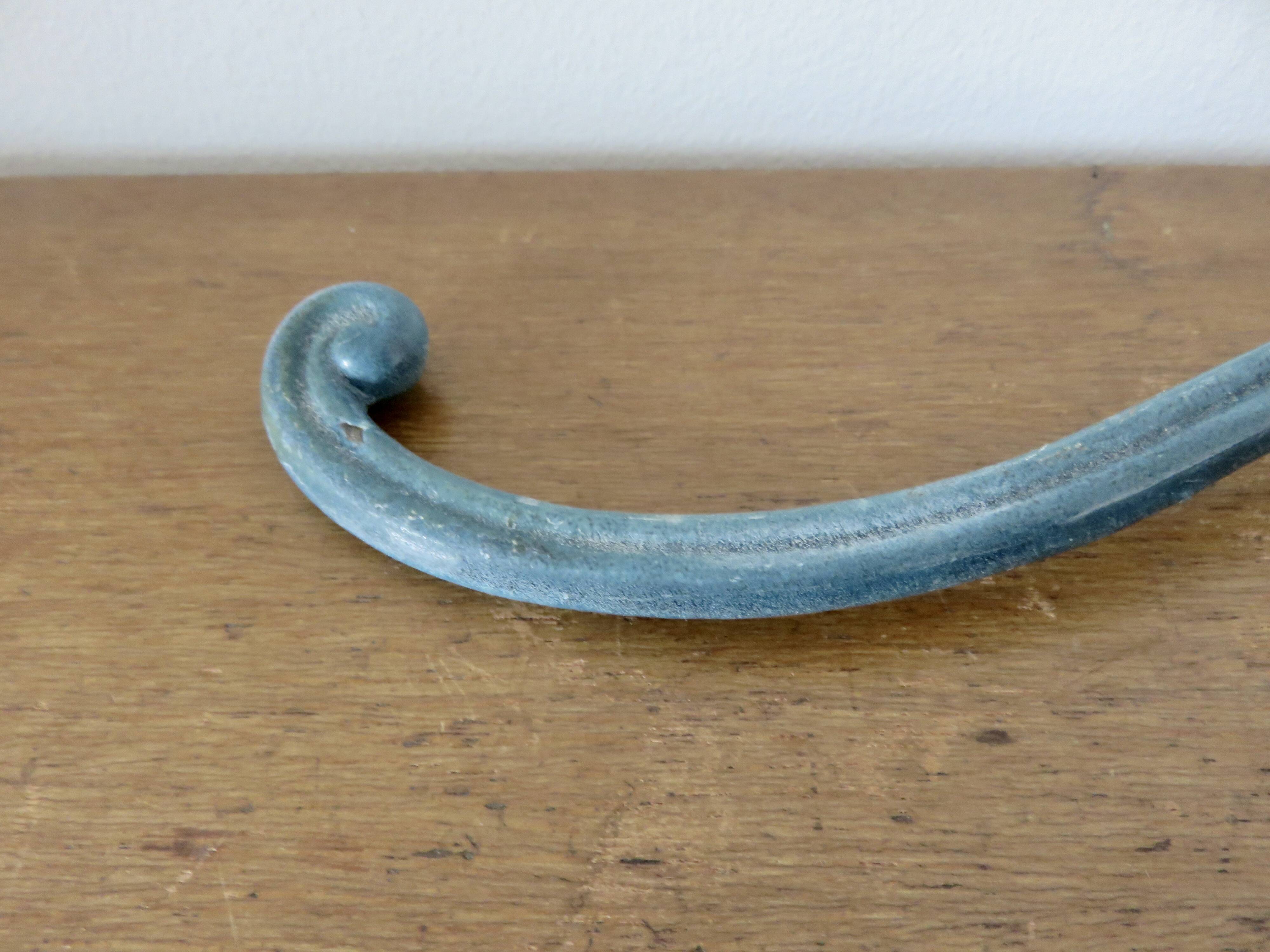 Old blue enamelled cast iron coat hook