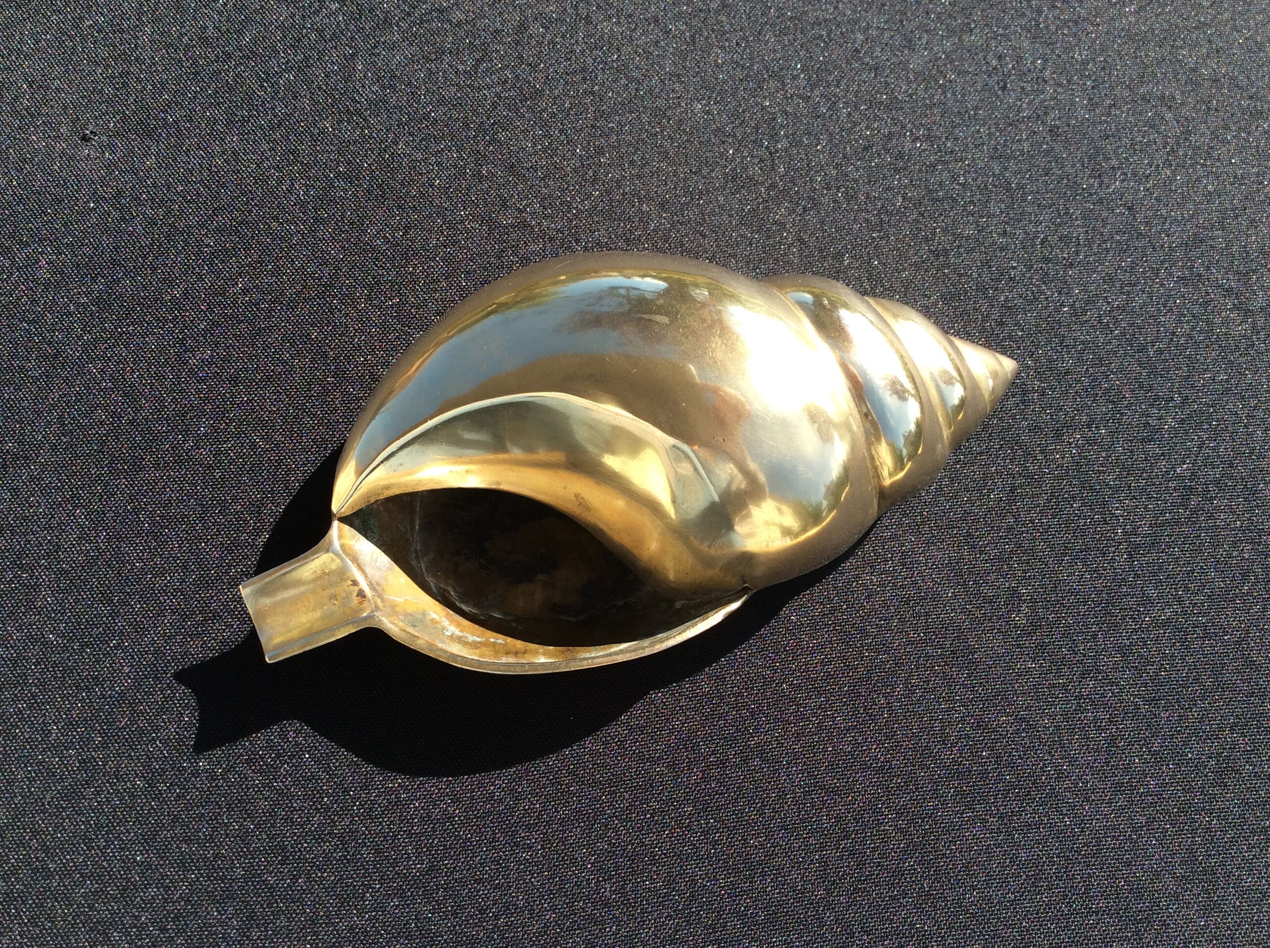 Shell brass ashtray