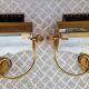 Pair of wall sconces in gilded brass 1970