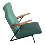 Lounge or easy chair with armrests