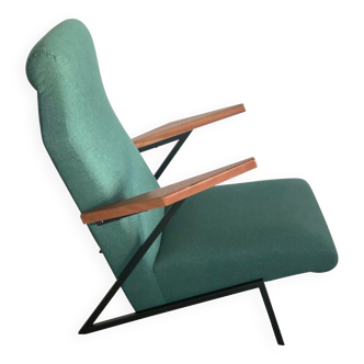Lounge or easy chair with armrests