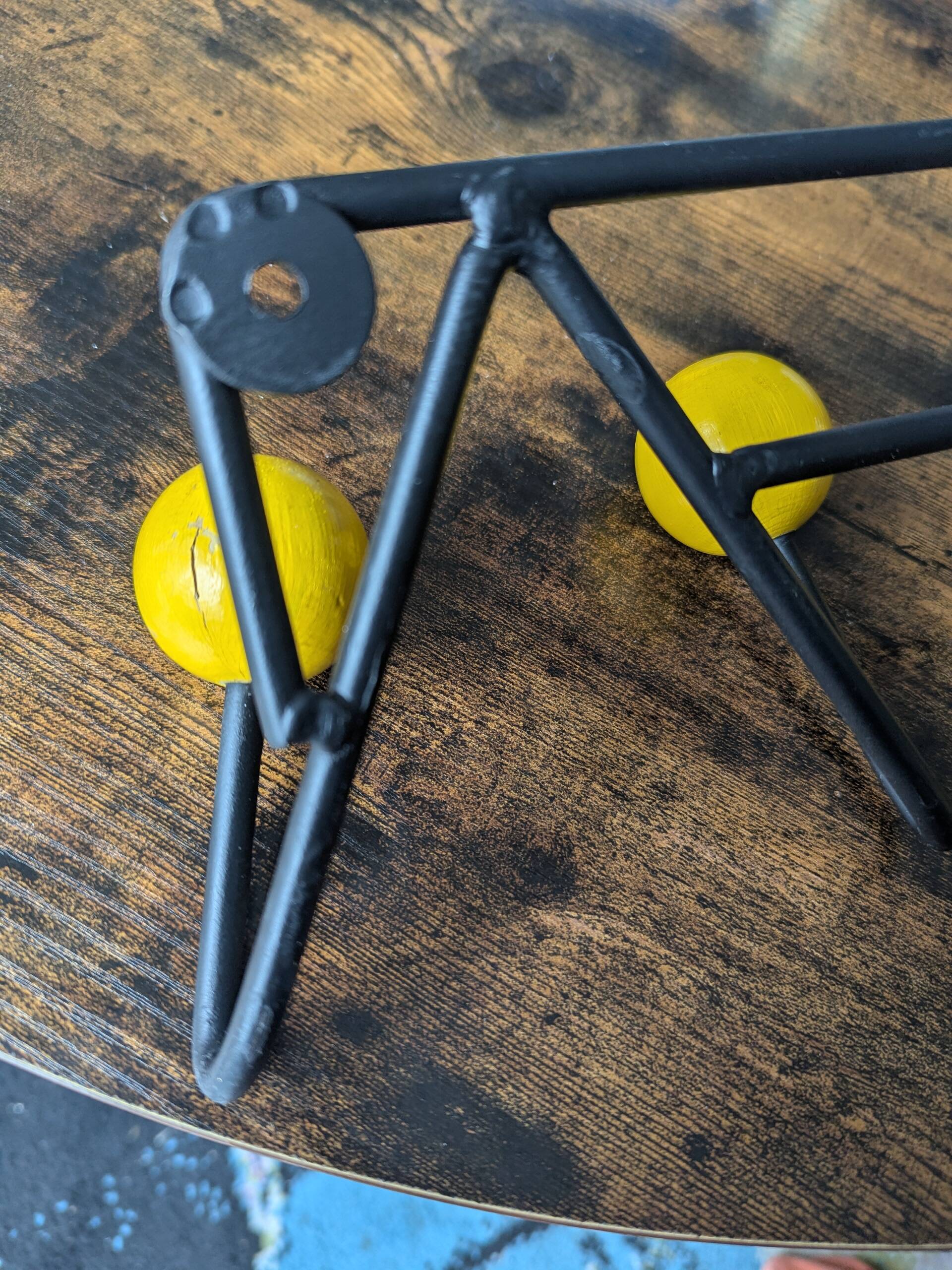 Vintage coat rack Roger Feraud with 4 yellow ball hooks.