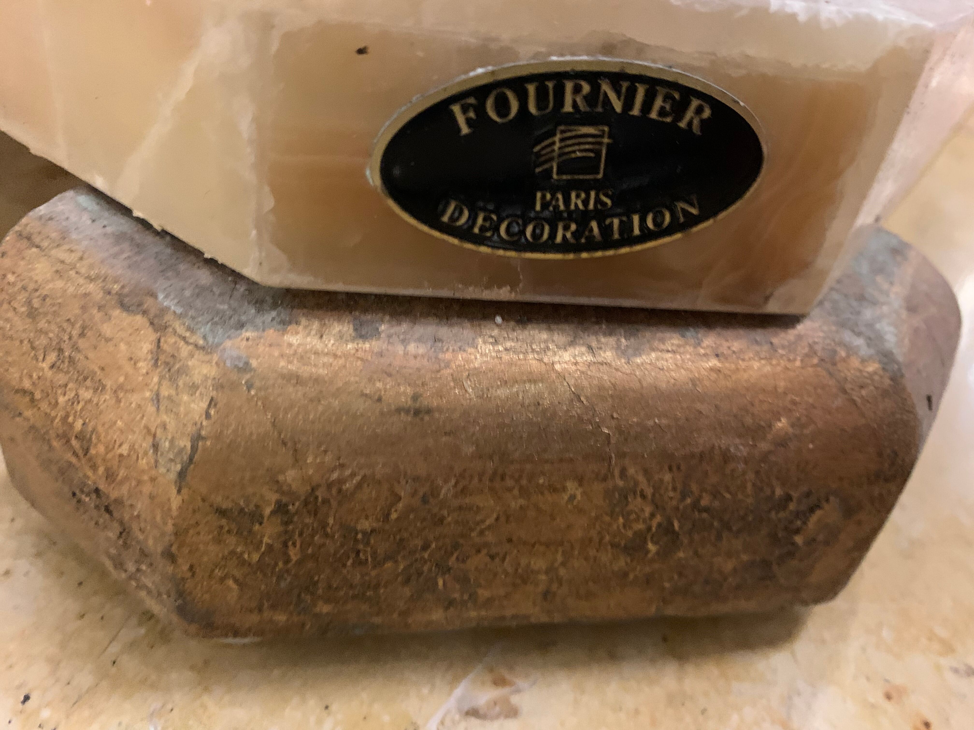 Travertine console from Fournier Paris over glass