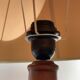 Turned wooden lamp old bluish gray lampshade