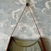 Wall mirror with brass detail and leather mounting, Vetreria Andreini, Ravenna, Italy, 1950s