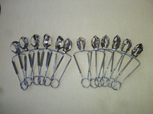 Set of 12 stainless steel snail clamps Létang and Rémy