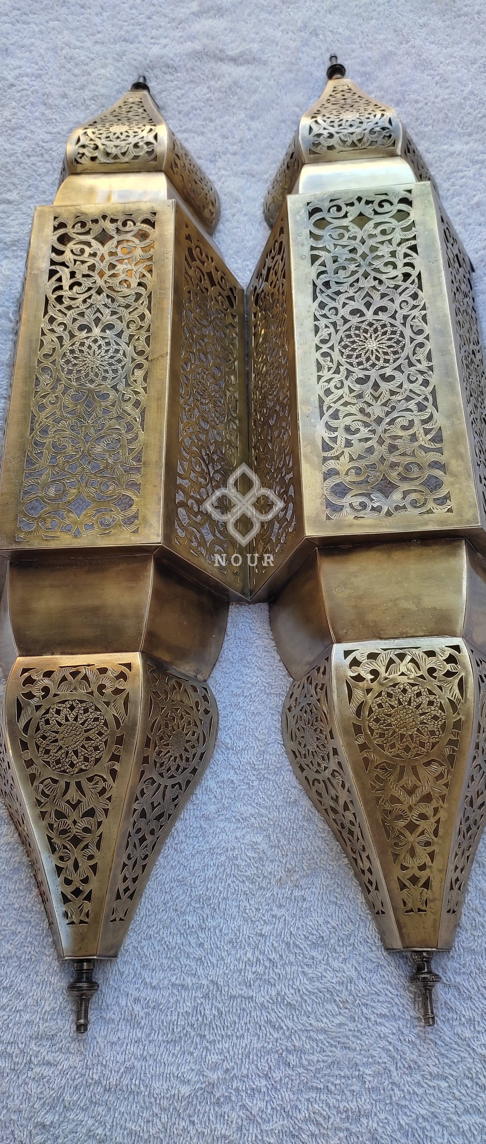 Moroccan brass wall lamp with an antique look