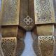 Moroccan brass wall lamp with an antique look